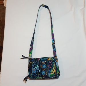 Spacious vera Bradley cross body bag.